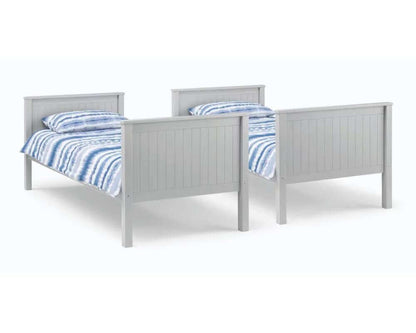 View of dove grey bunk beds parted into two single beds side by side - White background