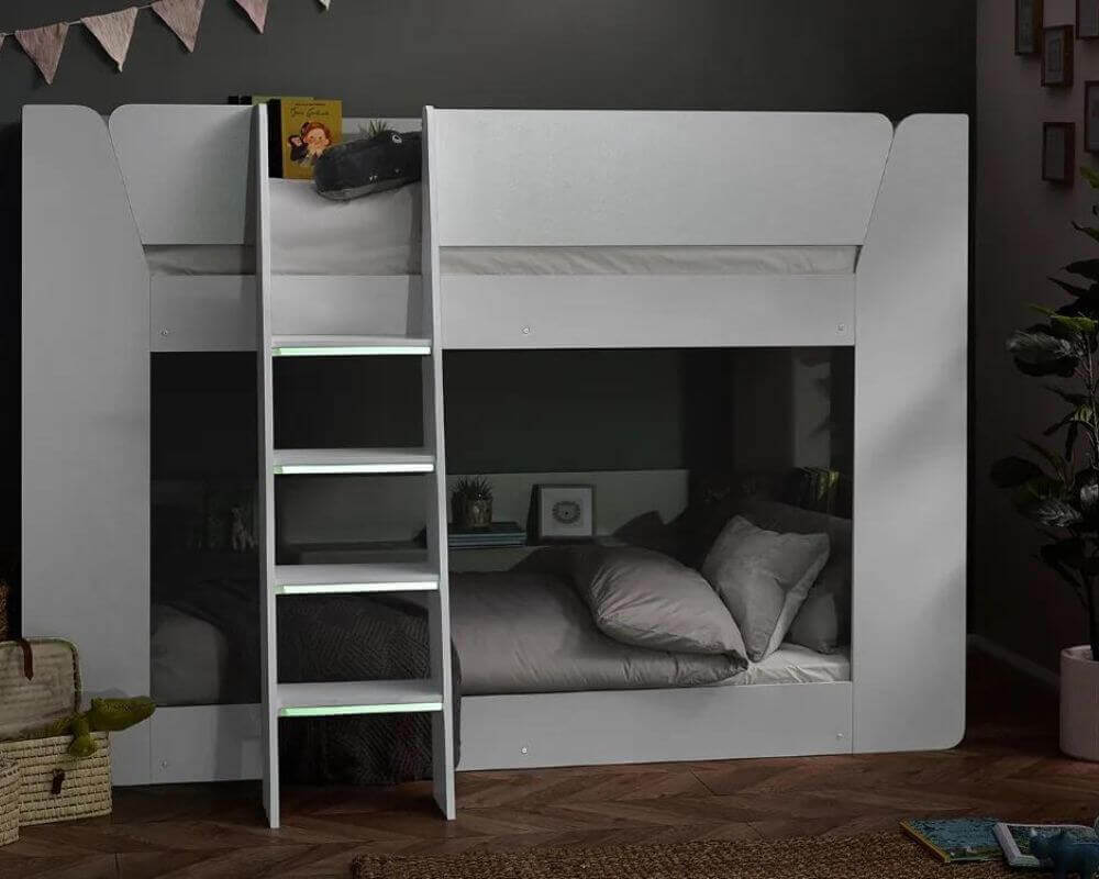 Front view of a white bunk bed - Dark bedroom setting