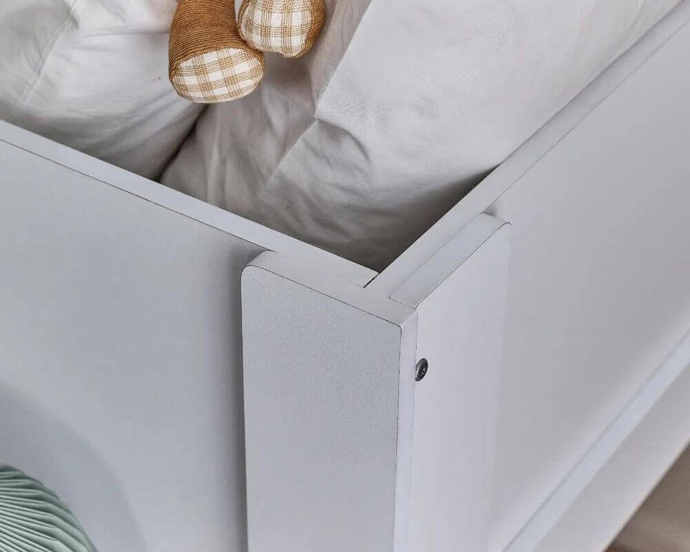 Image of a white cabin bed showing top bed corner - Bedroom Setting